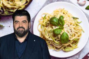 Cannavacciolo in primo piano e piatto di spaghetti con basilico