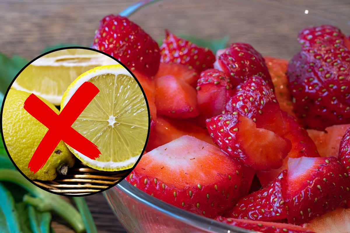 Ciotola di fragole a pezzi e limoni
