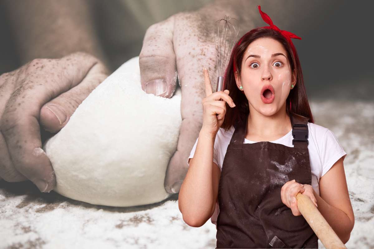 ragazza con grembiule e impasto della pizza