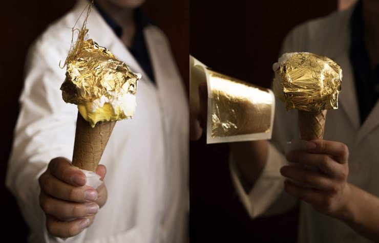 cono gelato in mano a chef coperto oro