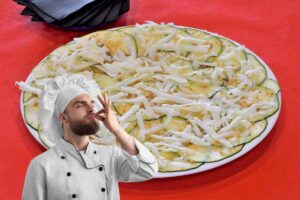 chef e piatto con carpaccio di verdure